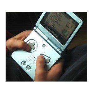 Kid playing electronic game