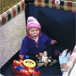 Baby in a cot