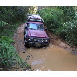 Driving through water on a track