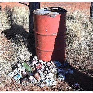 Overflowing rubbish out of a barrel