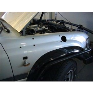 Installation photo showing installation holes with the main 86mm hole