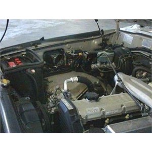 Installation photo showing the inside of the engine bay 