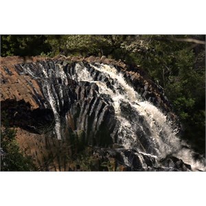 Fast shutter speed of 1/350 second shows crisp water droplets suspended in action