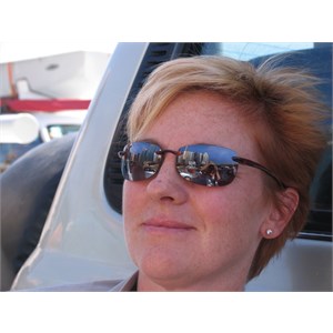 Sunglasses reflect Sydney skyscrapers