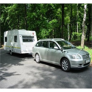Sedan towing a caravan