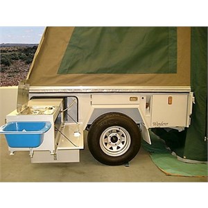 A kitchen that slides out the side of the camper trailer