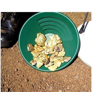 Big gold nuggets in a gold pan