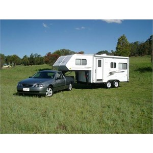 Venture Fifth Wheel caravan being towed by a Ford Falcon
