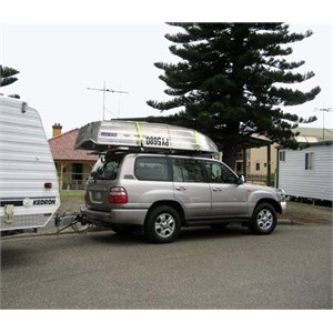 Tinnie stowed on the roof of a 4WD