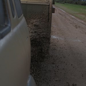 Glutinous mud sticks to van