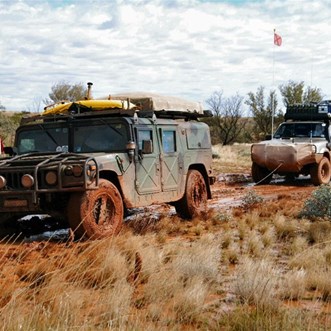 Pootrol to the rescue - Extracting the Hummer from the bog.