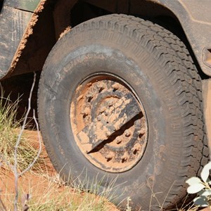 The Hummers destroyed rear tyre (slash at 10 o'clock on tyre)