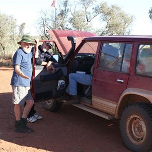 John and his able assistants tending to Willems vehicle