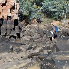 Al checking out the caverns at pools end. He provides a good indication of the depth when full