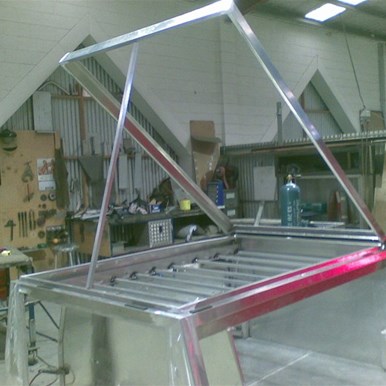 Lid up showing interior bed area