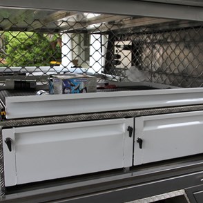 Drivers side drawers and top slide