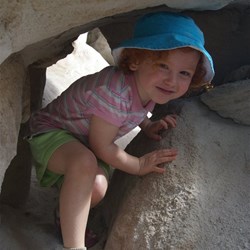 Peta exploring the Sandstone caves at Marlong Arch, Mt Moffatt 