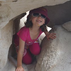 Ashley exploring the sandstone caves at Marlong Arch