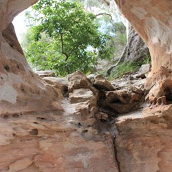 Eroded section through the base of the Arch