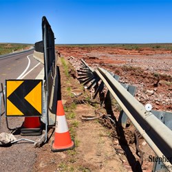 The damage to the Stuart Highway at Woocalla Creek.