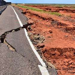 The damage to the Stuart Highway at Woocalla Creek.