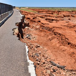 The damage to the Stuart Highway at Woocalla Creek.