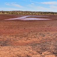 Gibbers, water and sandhills on the way to Old Andado Station