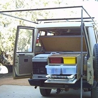 Tent frame slides into roof rack