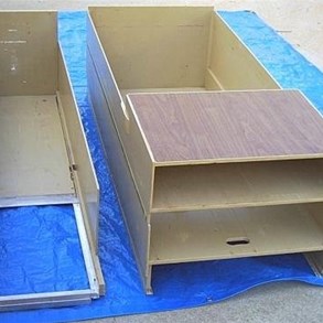 The drawers, carpenter's special running on ball race wheels centred on each side 