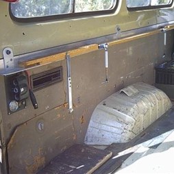 Bed base support fitted to seat anchorage points