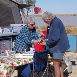 Ruth and Ian shelling their feast