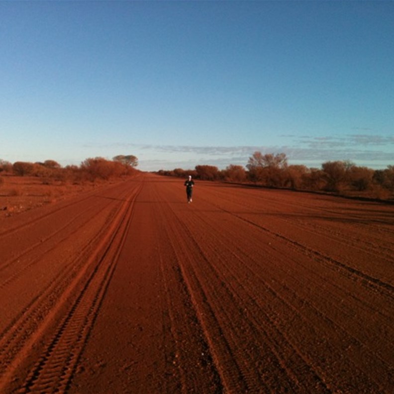 Running along the Gunbarrel Hwy