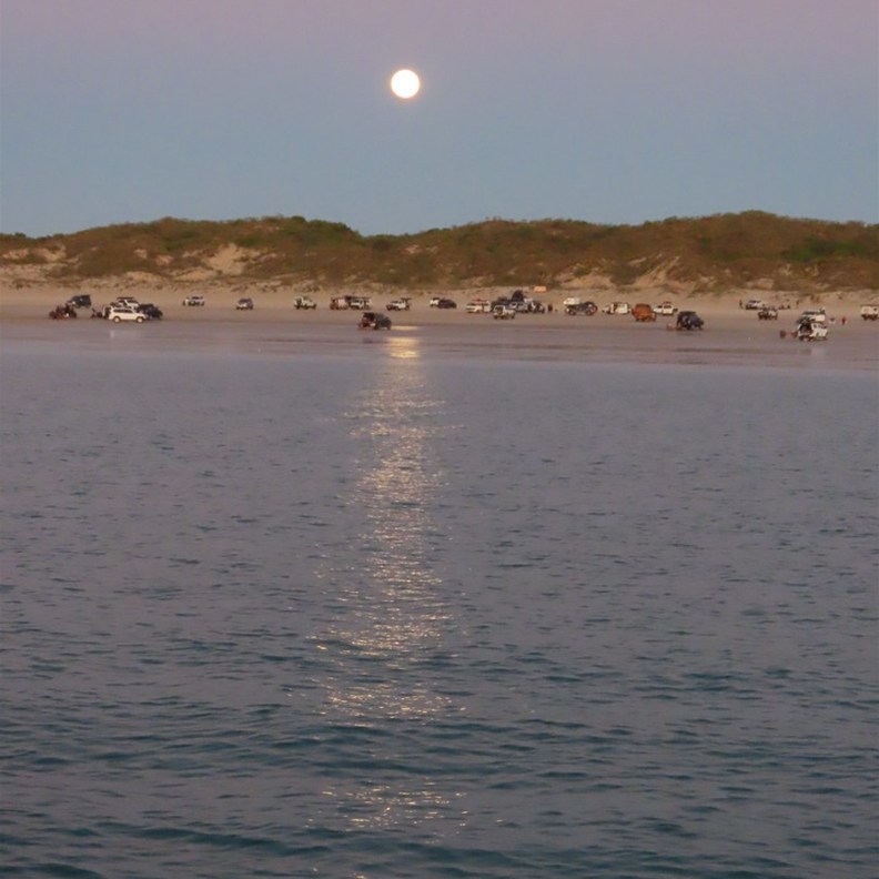 Moonrise over the water