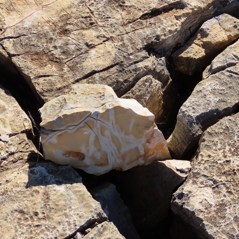 The rock under the surface is an amazing colour
