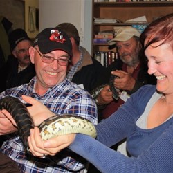 Smiles all round in the Bob Cooper snake handling session