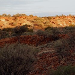 The setting sun lighting up the rock walls