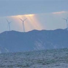 Sunrise behind Albany wind farm