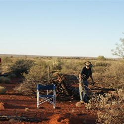 MJ getting the fire set.