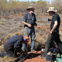 John working while the supervisors supervise (and drink tea!)