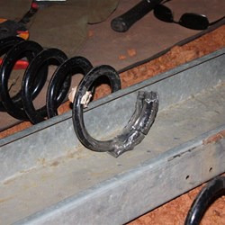 The broken coil spring