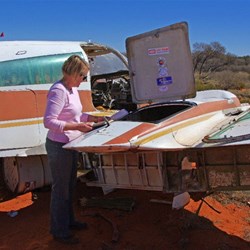 Fiona adds our names to the Visitors Book