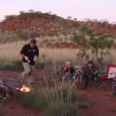 Camp cook getting the spuds on the fire.