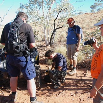 Fixing a puncture on Scotties quad on the way back