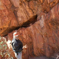 John and the crevasse containing the grinding stones