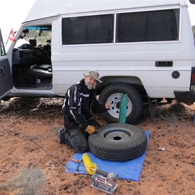 Scotty at the morning chores - Those bloody split rims!