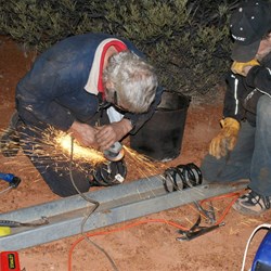 JW grinding the spring ends.