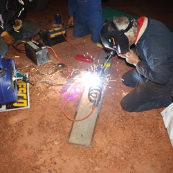 JW giving it his best with the bush welder.