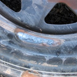 Welded cracks showing external position of fatiguing on Rim 1