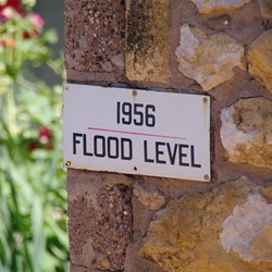 Flood Level Sign on Old Stone Shed