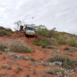 The tuck truck negotiating the steep southern side of a dune